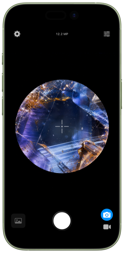 Microscope App gemstone examination view inside an iPhone frame